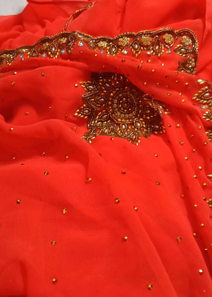 Elegant Orange stone Saree with stitched blo
