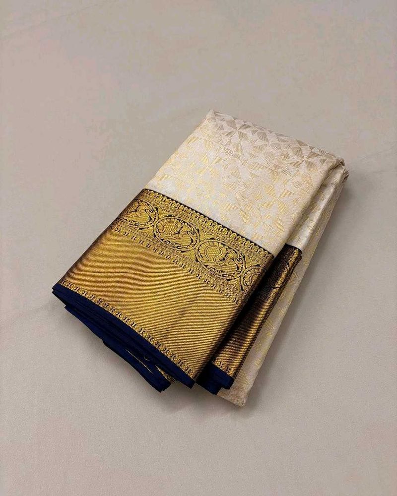 Elegant Off-White Saree with Gold Border