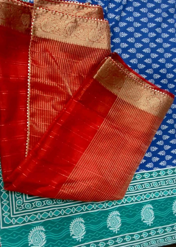 Elegant Red organza zari bordered Saree