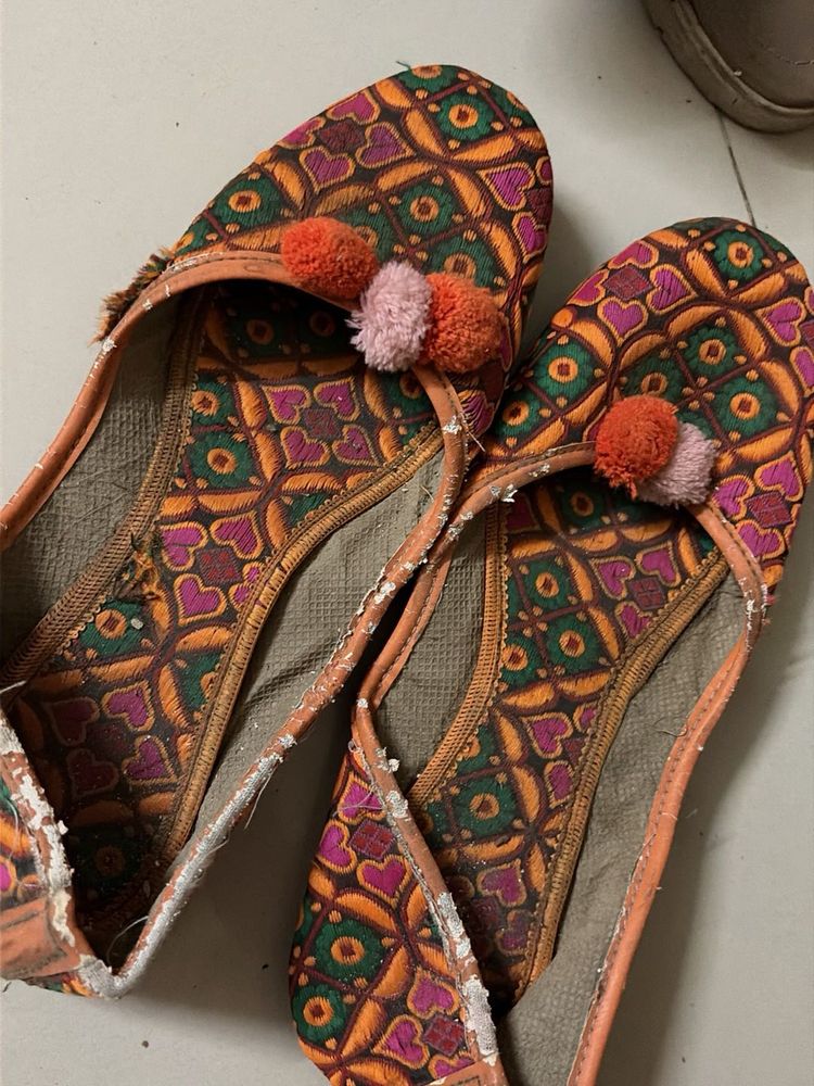 Embroidered Juttis with Pom-Poms