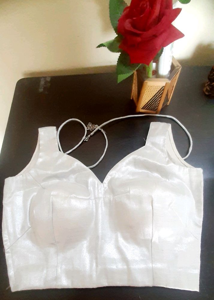 Beautiful silver shine sleeve less blouse 👚 side zip and margin also avilable 👍