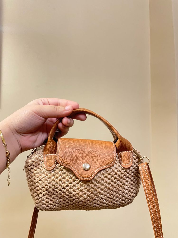 Chic Woven Crossbody Bag with Cute Charm
