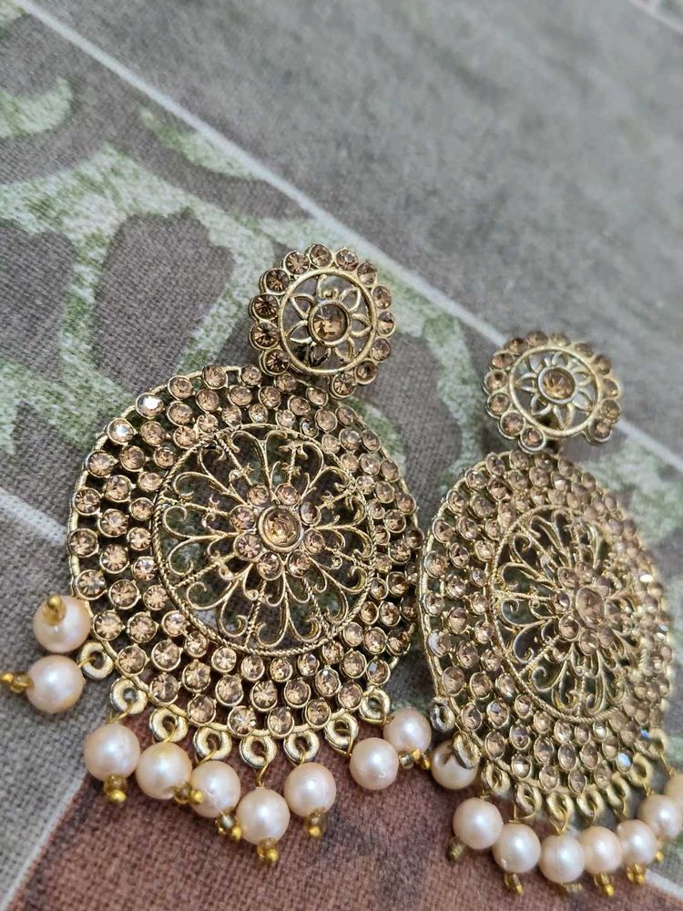 Exquisite Gold Jhumkas with Pearls