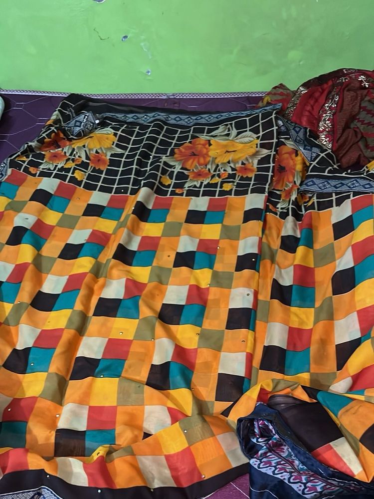 Vibrant Chequered Saree with Floral Motifs