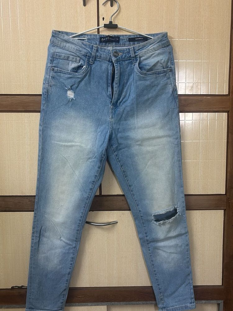 Ripped Light Wash Denim Jeans