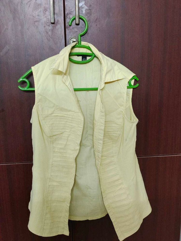 Yellow sleeveless shirt for women