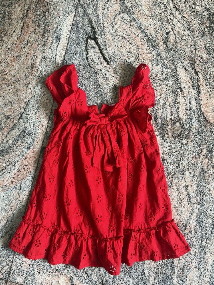 Charming Red Eyelet Dress with Bow Detail