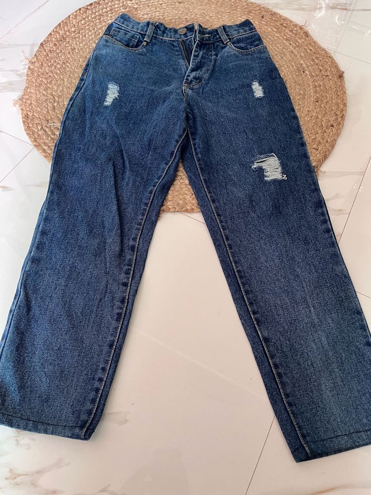 Distressed Blue Denim Jeans