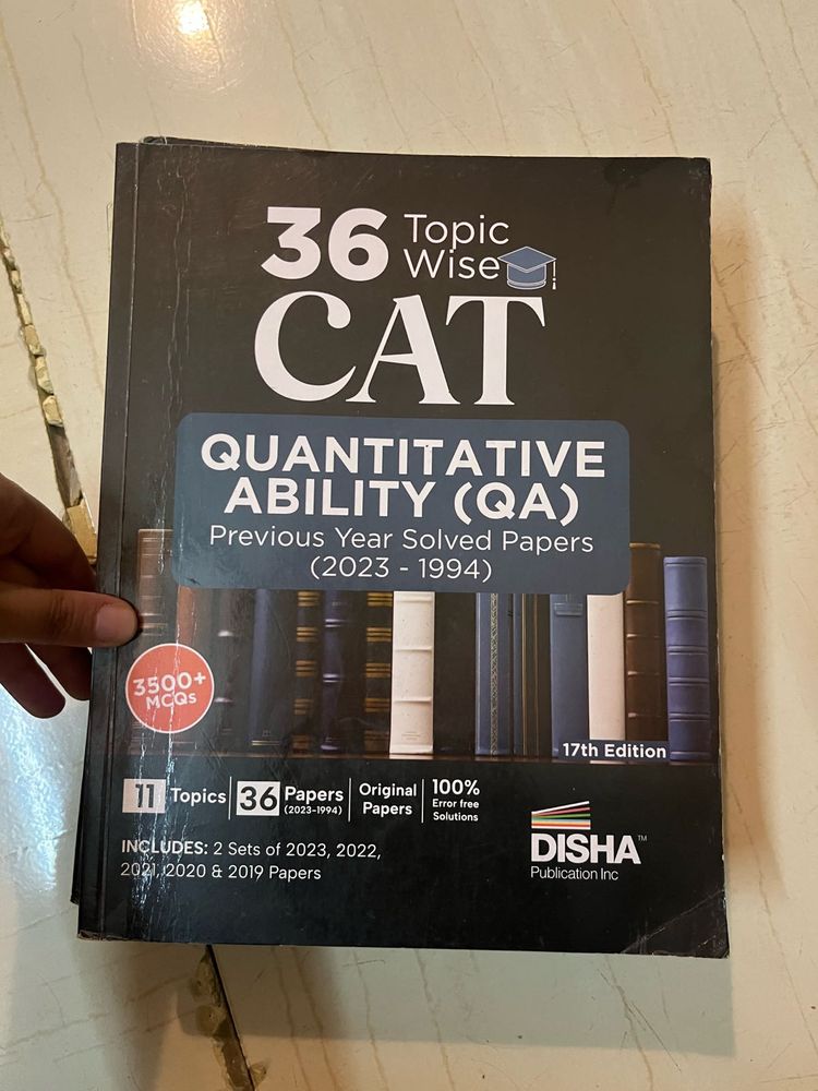 set of 2books cat 2023-1994