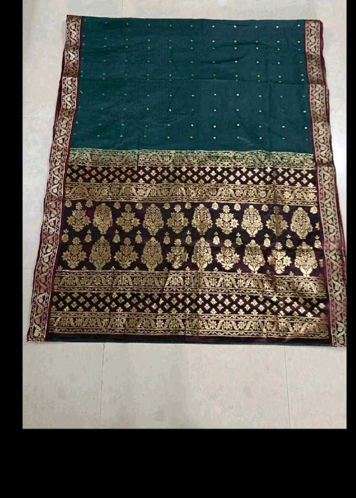 Elegant Teal Saree with Golden Border