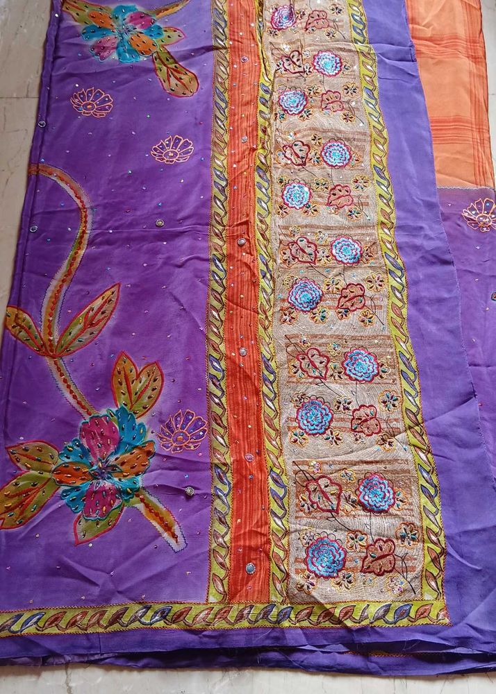 Vibrant Purple Saree with Floral Embroidery