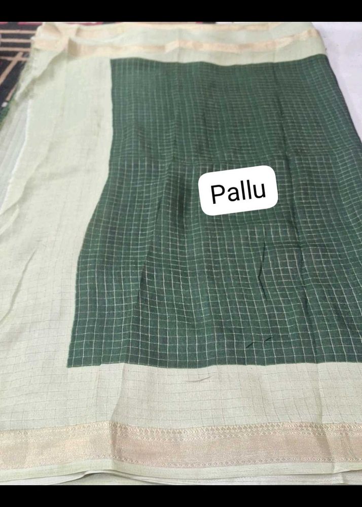 elegant green saree with gold checks &amp; border