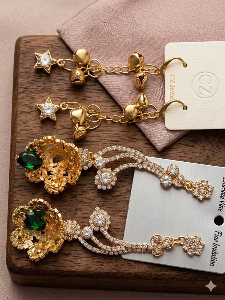 Elegant Gold Earrings with Green Stone