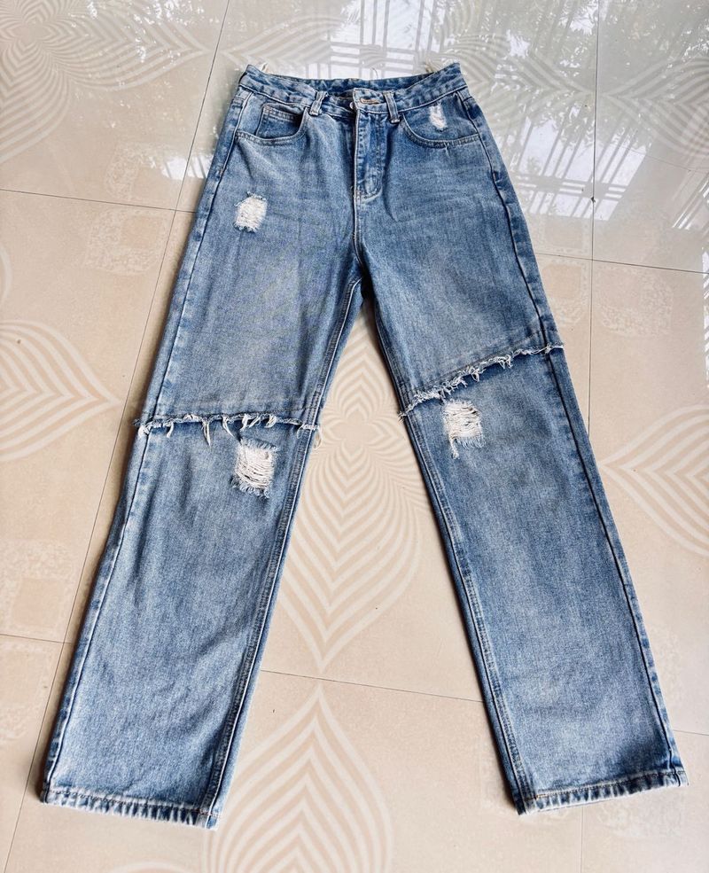Ripped Light Wash Denim Jeans