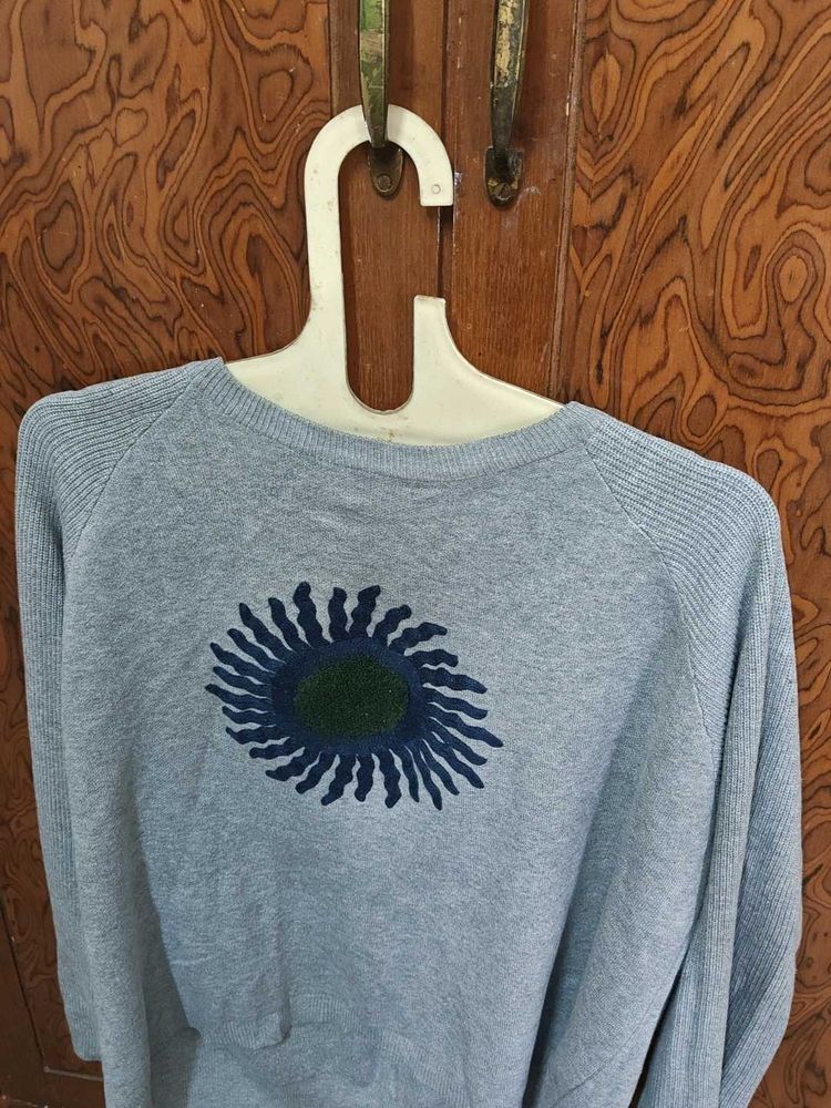 Grey Knit Sweater with Sun Design
