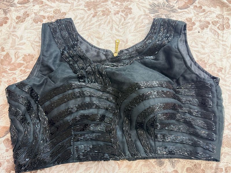 Embellished Padded Sleeveless Blouse