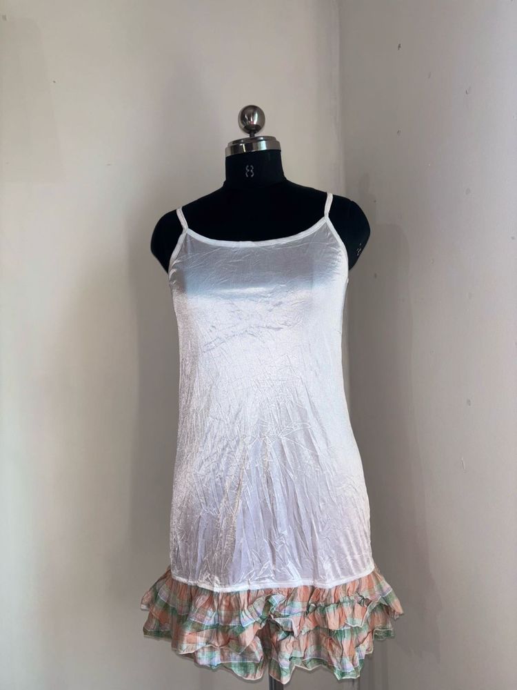 White Slip with Ruffled Hem