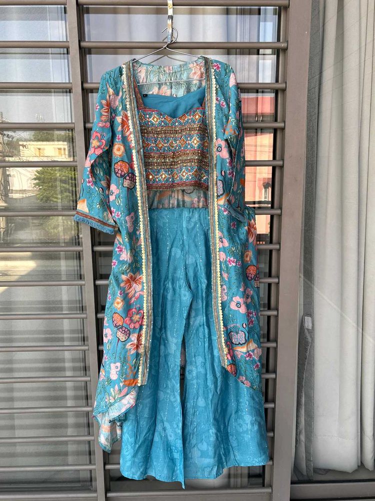 Beautiful Teal blouse and shrug Set with Palazzo