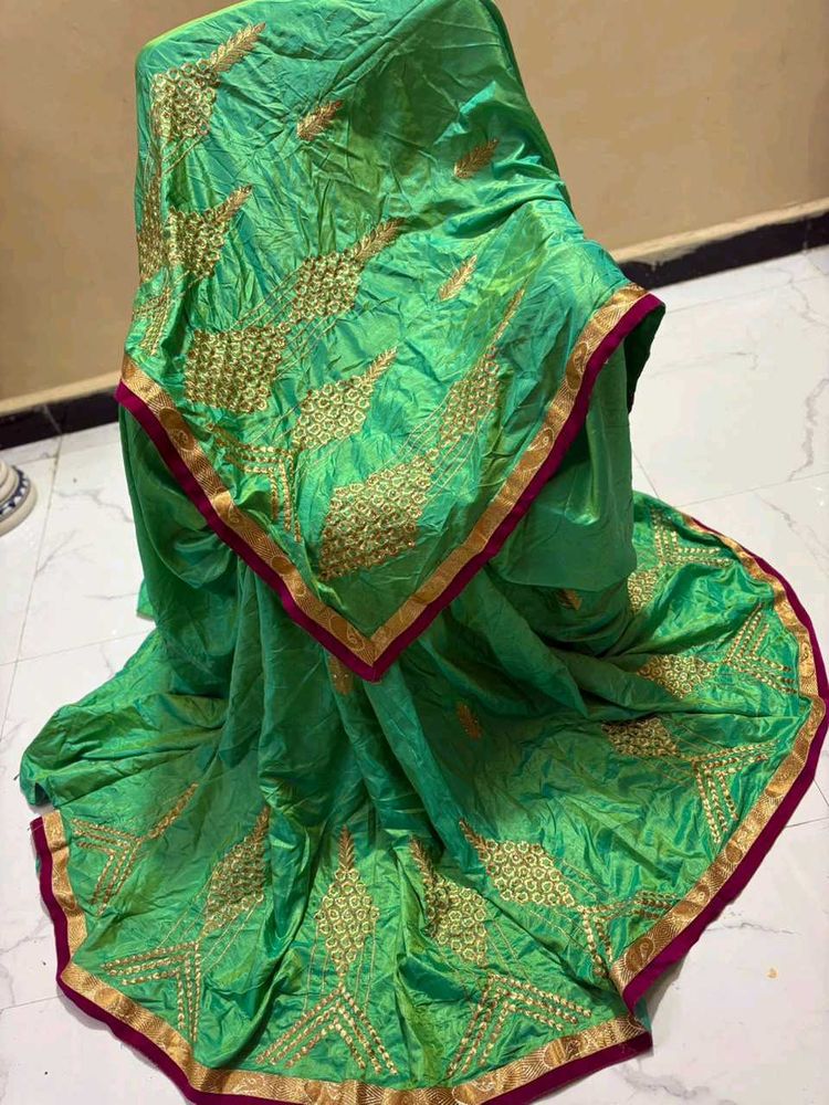 Vibrant Green Silk Saree with Gold Embroidery