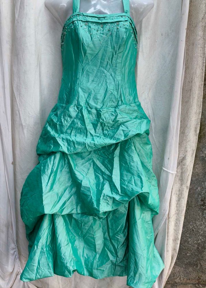 232112. Stunning Teal Tiered Gown