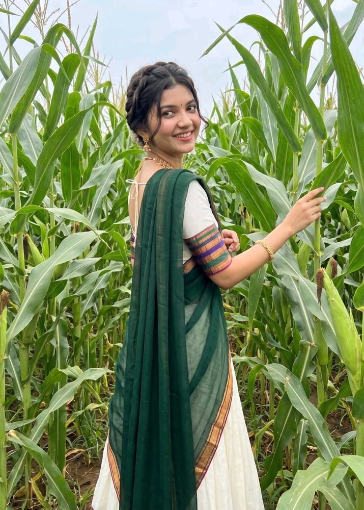 Elegant White Saree with Dark Green Border