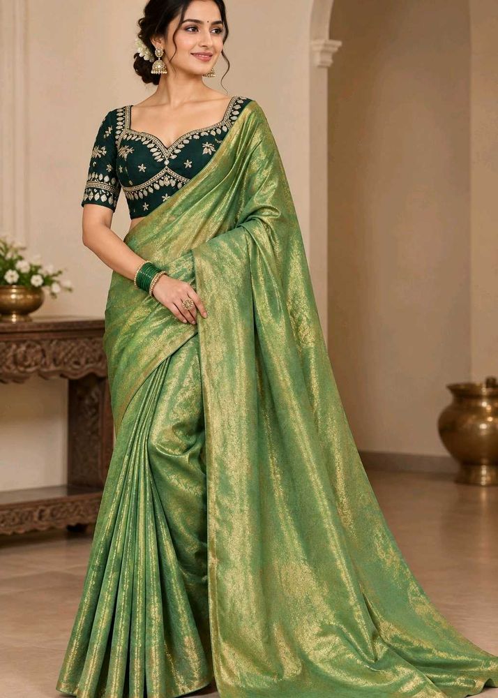 Elegant Green Silk Saree with Embellished Blouse