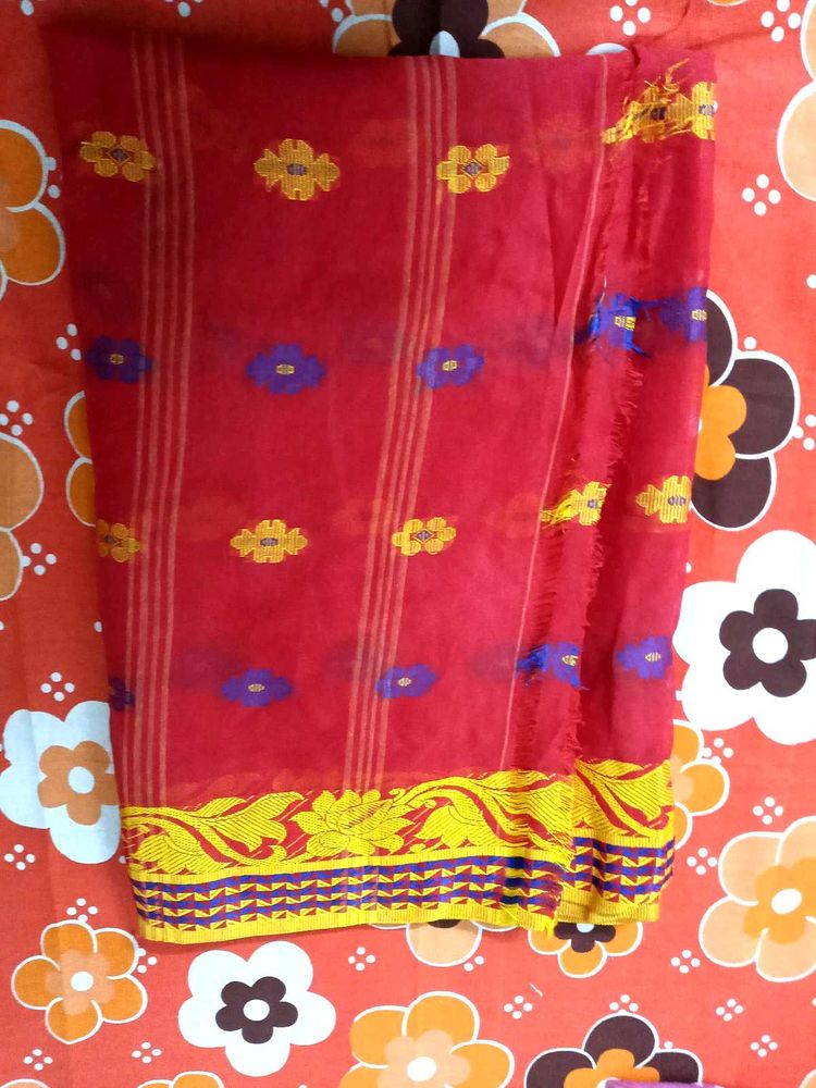 Vibrant Red Saree with Floral Motifs