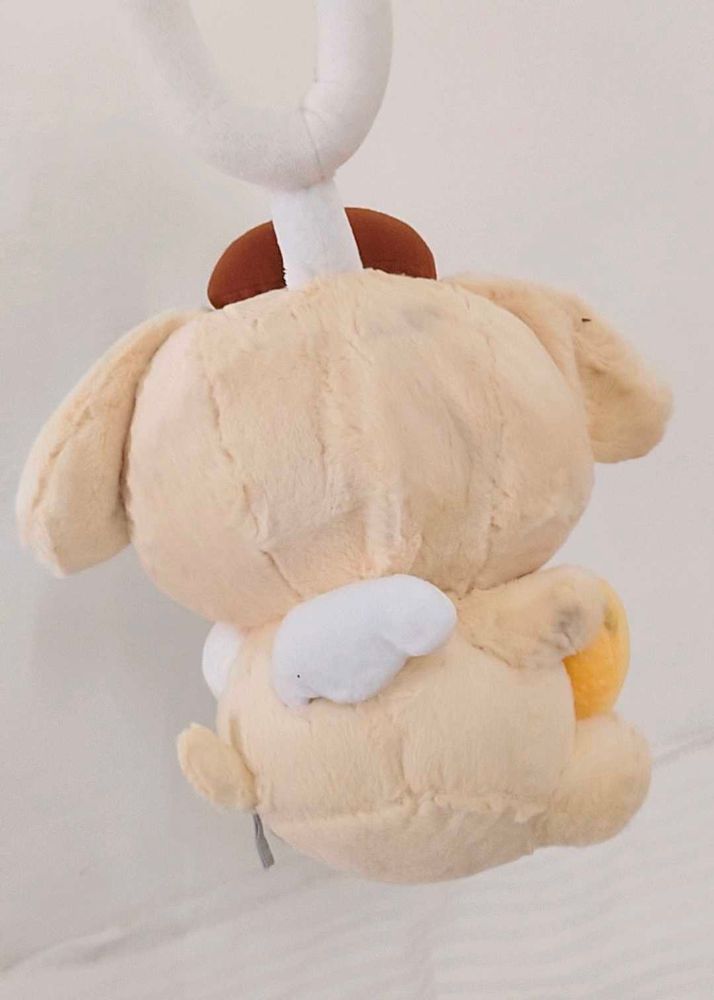 Sanrio Angel Pompompurin  holding a smalll