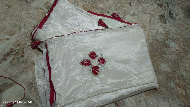 Elegant white Saree with Red Border