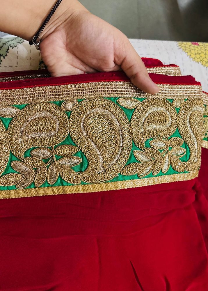 heavy red bordered saree with blouse