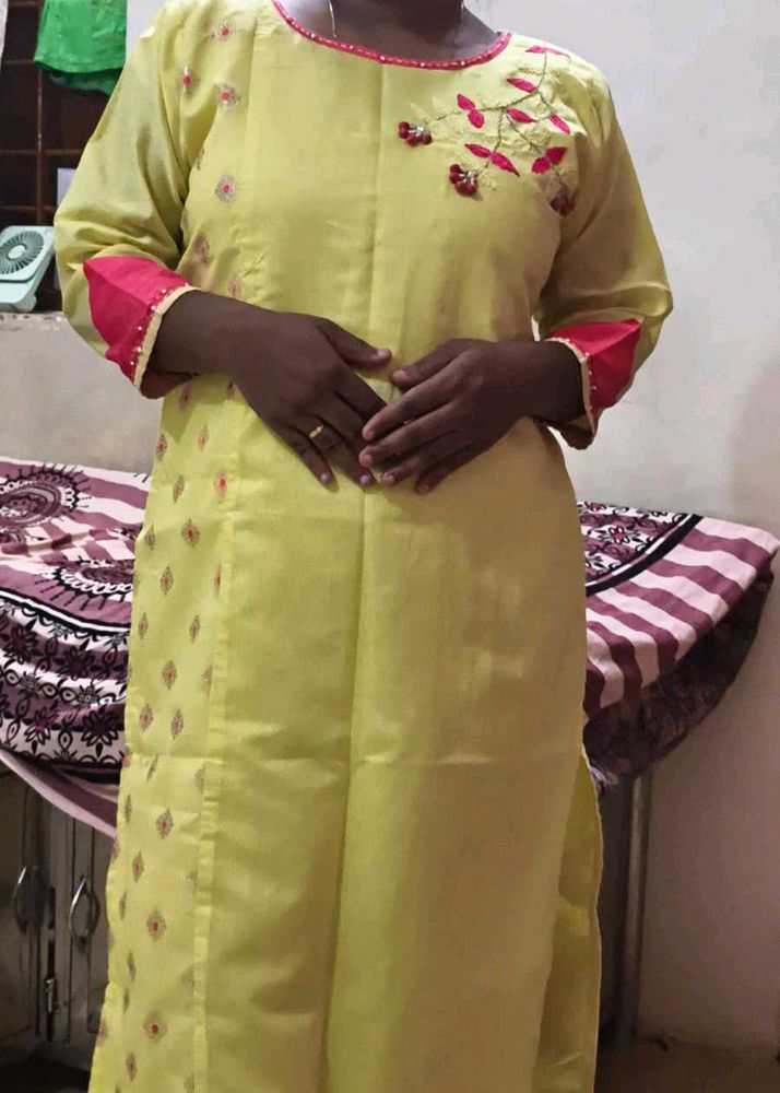 Elegant Yellow Kurta with Pink Embroidery