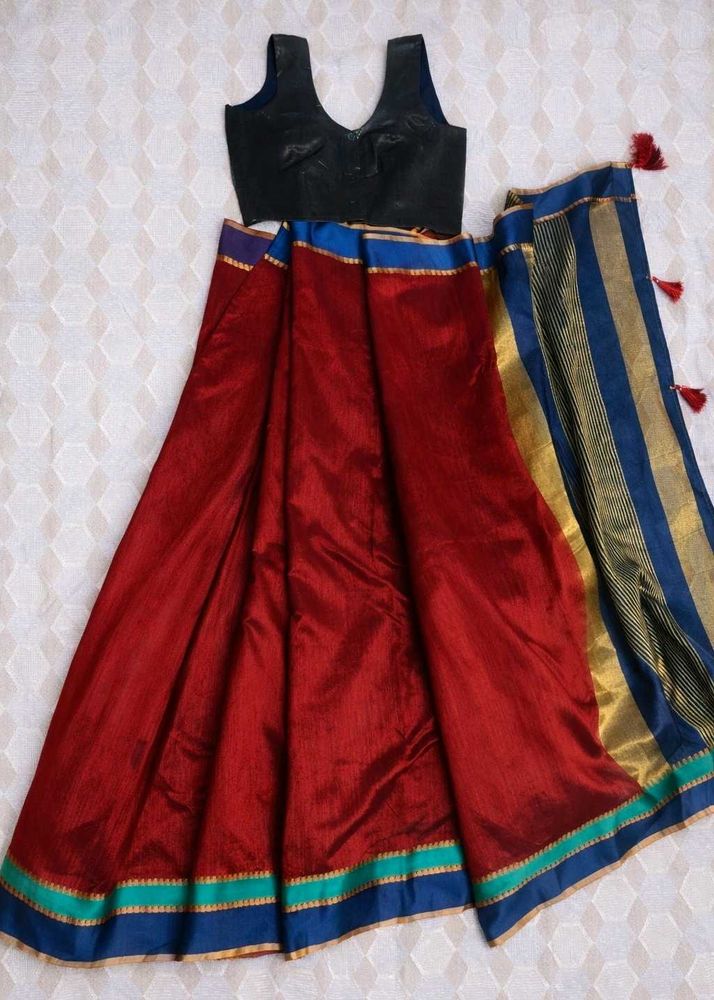 Maroon Saree With Sleevless Blouse