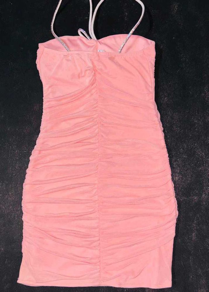 Peach ruched bodycon dress with sparkling ringston