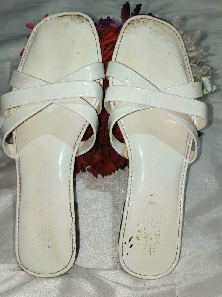 White patent criss-cross flats