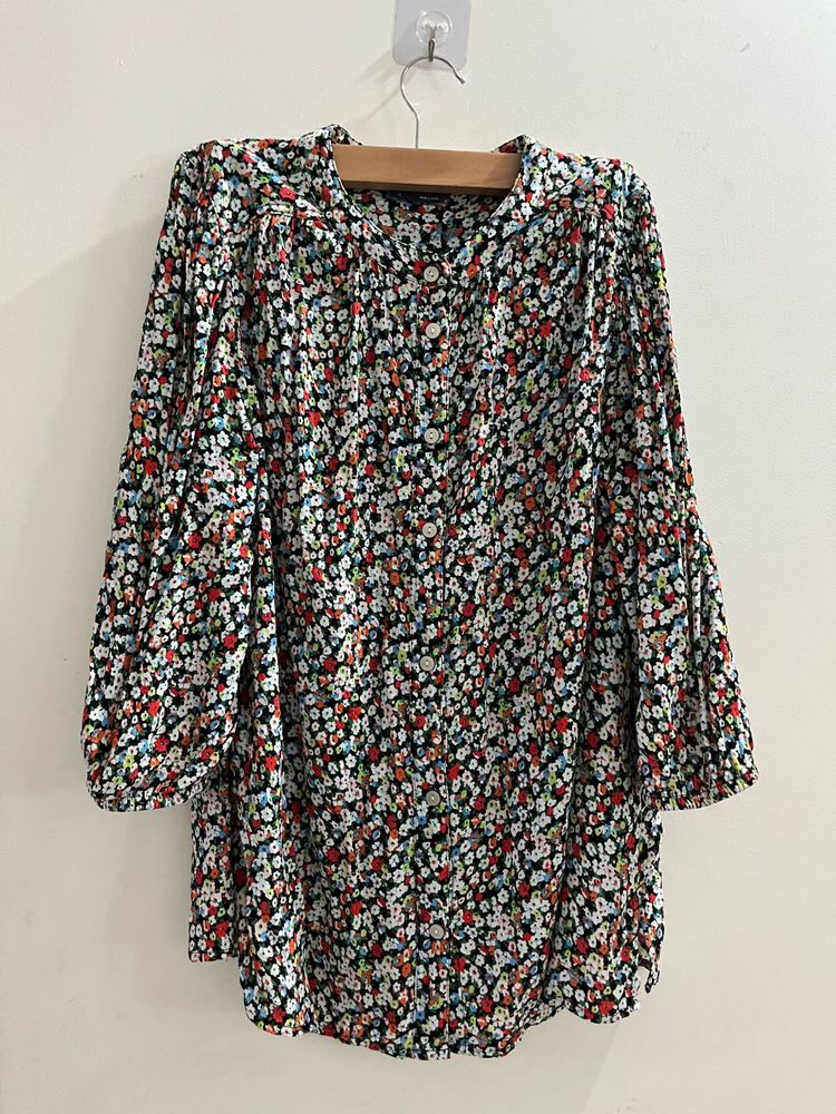 Marks and Spencer Floral Print Button-Up Tunic.