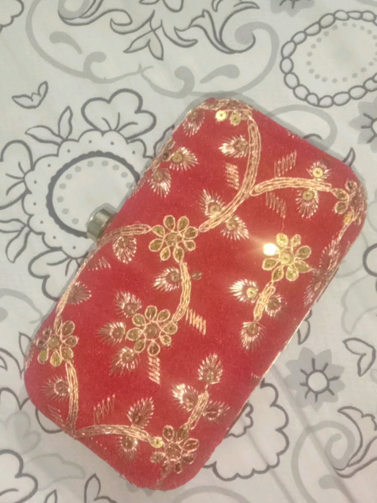Red clutch unused