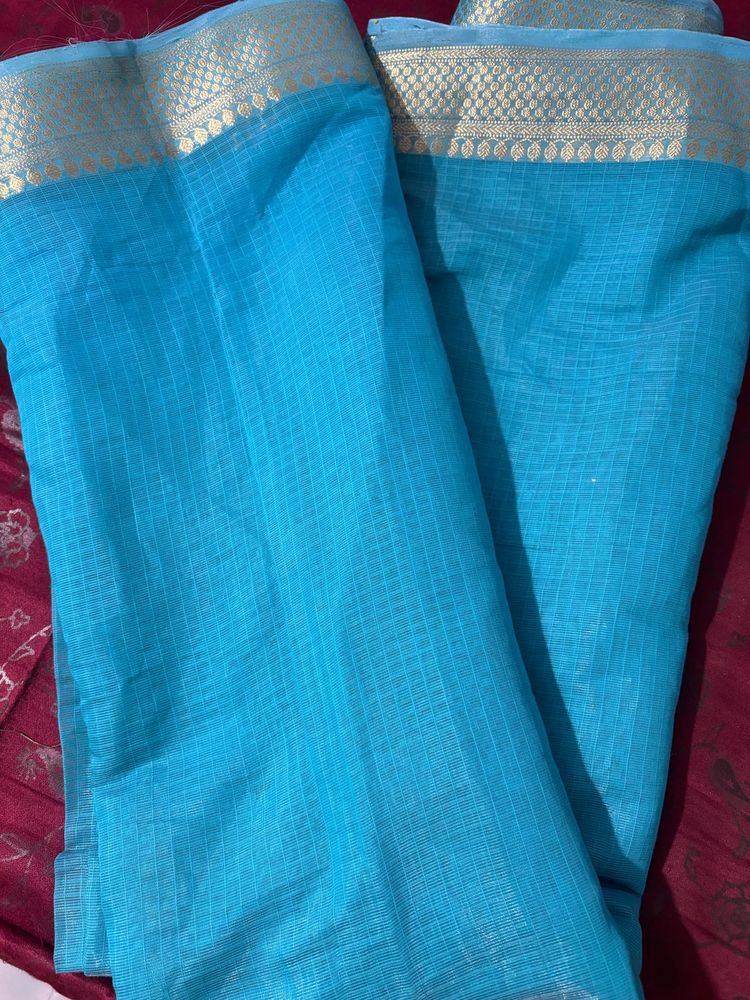 Elegant light Blue Saree with Golden Border