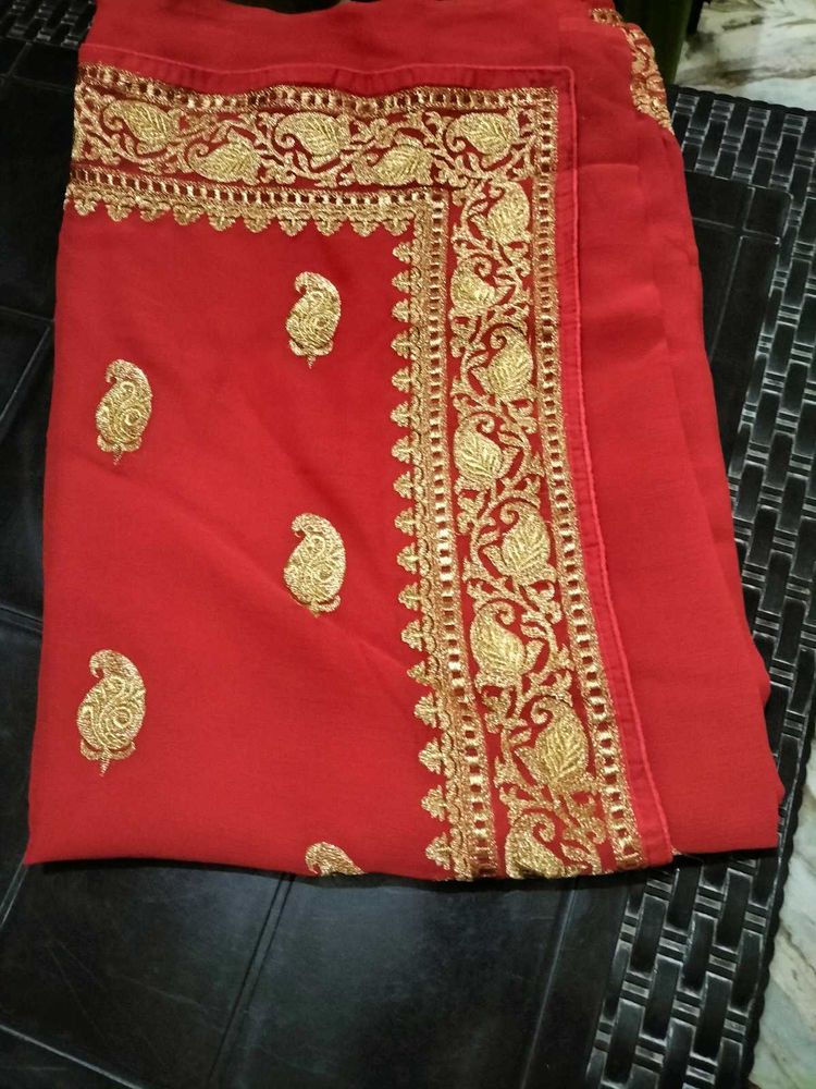 Elegant Red Saree with Gold Embroidery