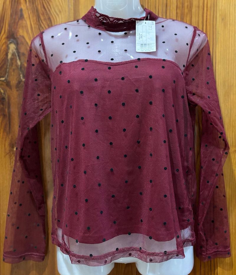 Polka dotted sheer top