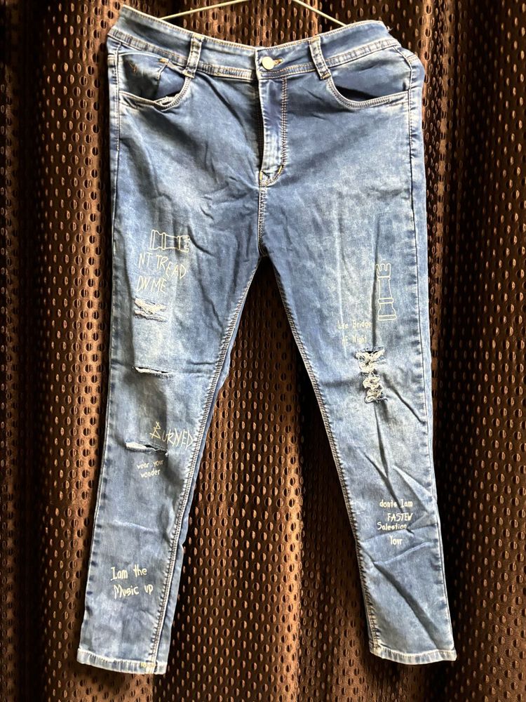 Distressed Denim Jeans