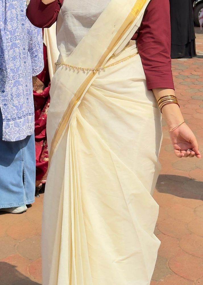 Elegant Off-White Saree with Gold Border and also