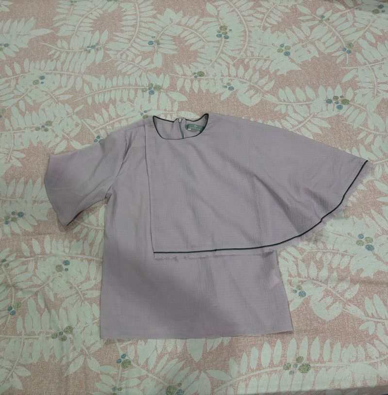 Elegant new rareism top