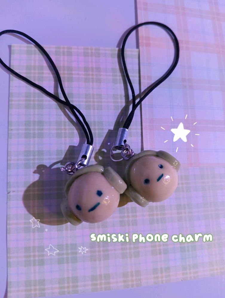 One Smiski Phone Charm