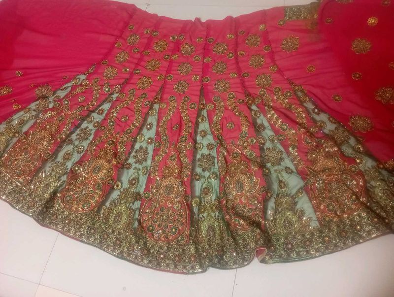 Rust  &amp; green ghagra saree