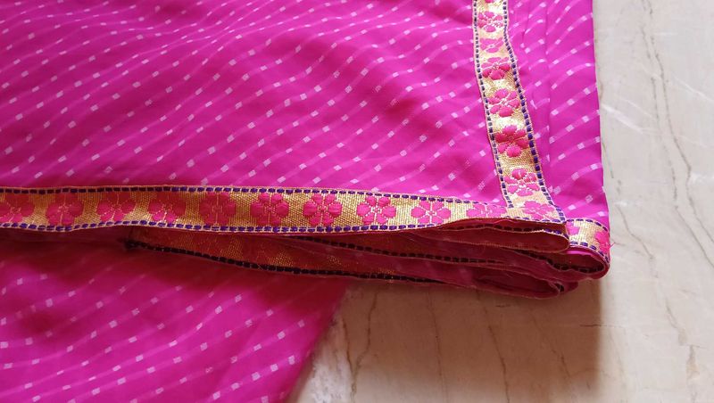 Vibrant Pink Saree with Floral Border