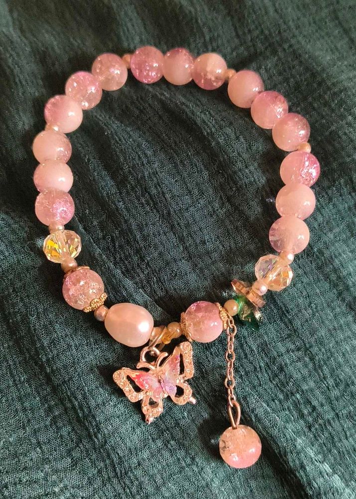 Sparkling Pink Beaded Bracelet with Butterfly Char