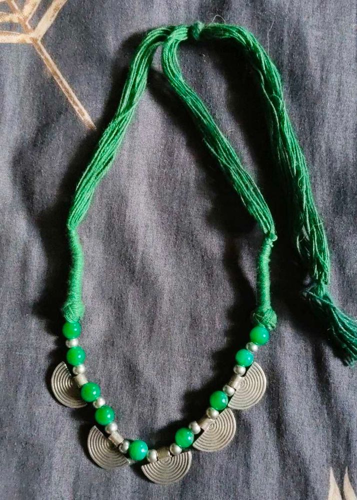 Green Beaded Necklace with Silver Charms