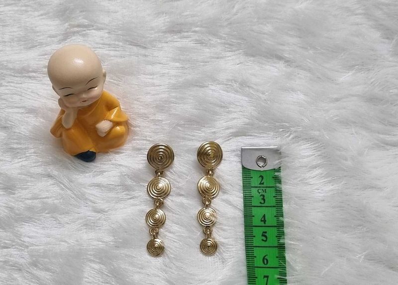 Gold spiral dangle earrings