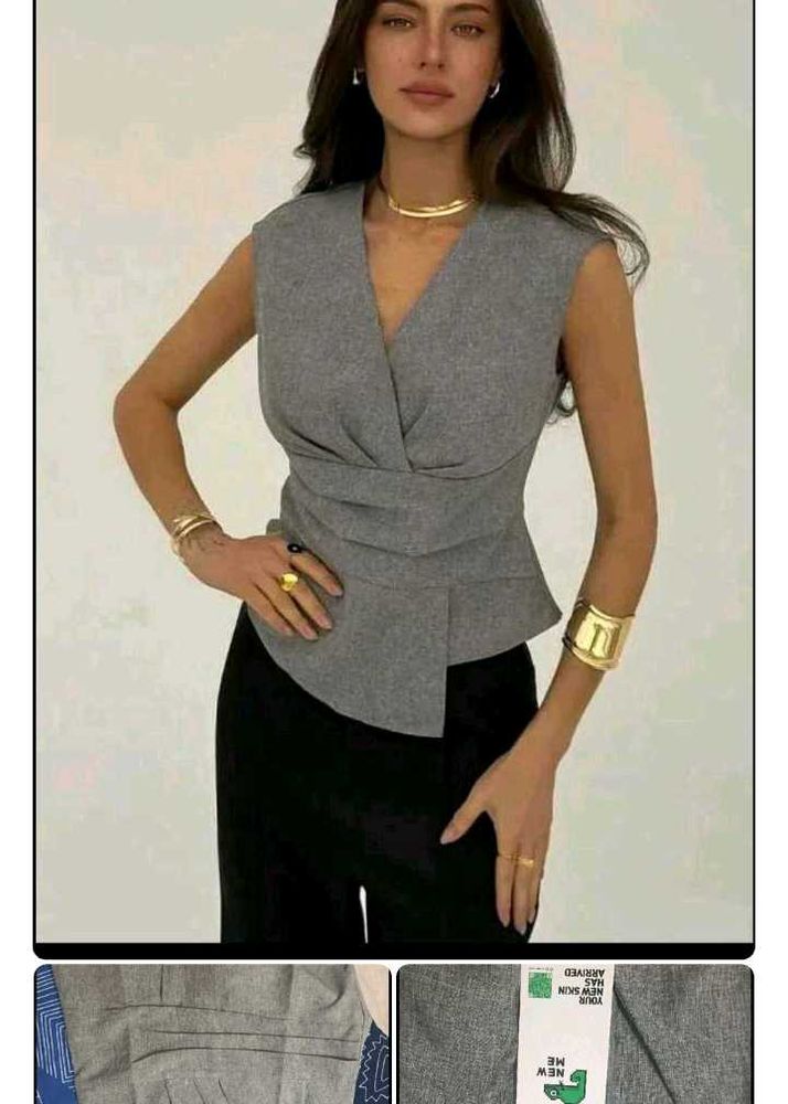 Chic Grey Sleeveless V-Neck Peplum Top