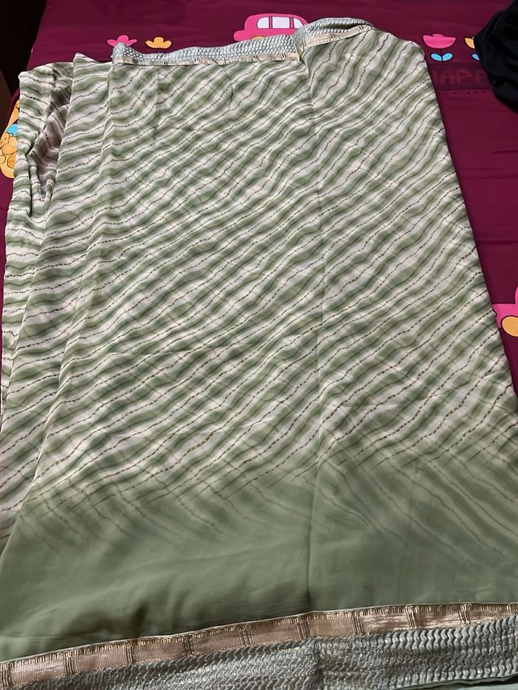 Beautiful Green Saree with Wave Pattern